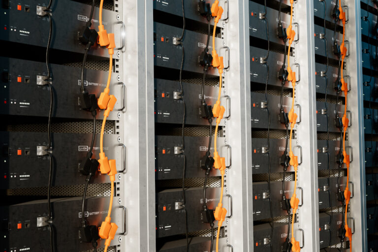 Image of batteries in a rack.